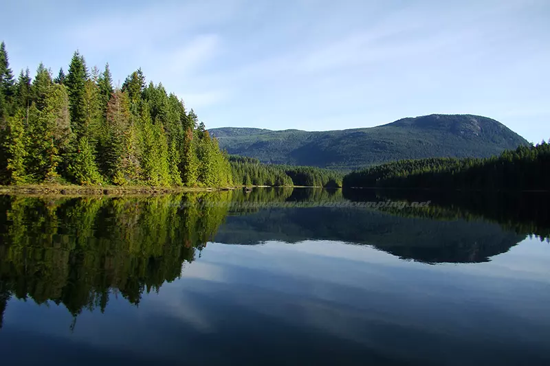 photo of a beautiful day on the water of Mohun Lake on Vancouver Island