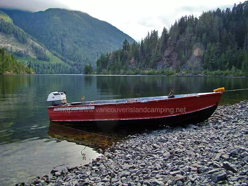 Photo of my boat on a natural boat launch at Atluck Lake Campground number two