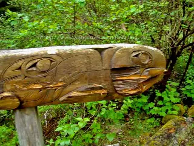 photo of a First Nation carved hand rail on a bridge on the portage trail leaving Gosling Lake
