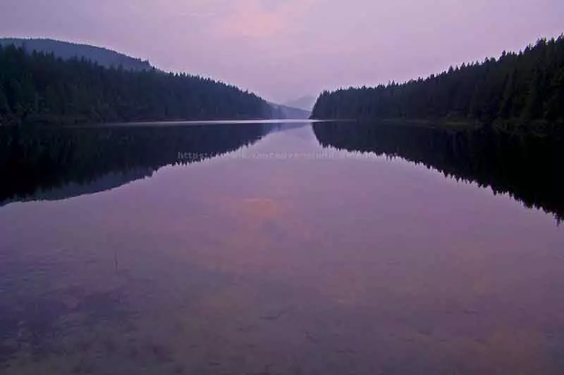 photo of a sunset over Stella Bay looking towards the narrows into Stella Lake