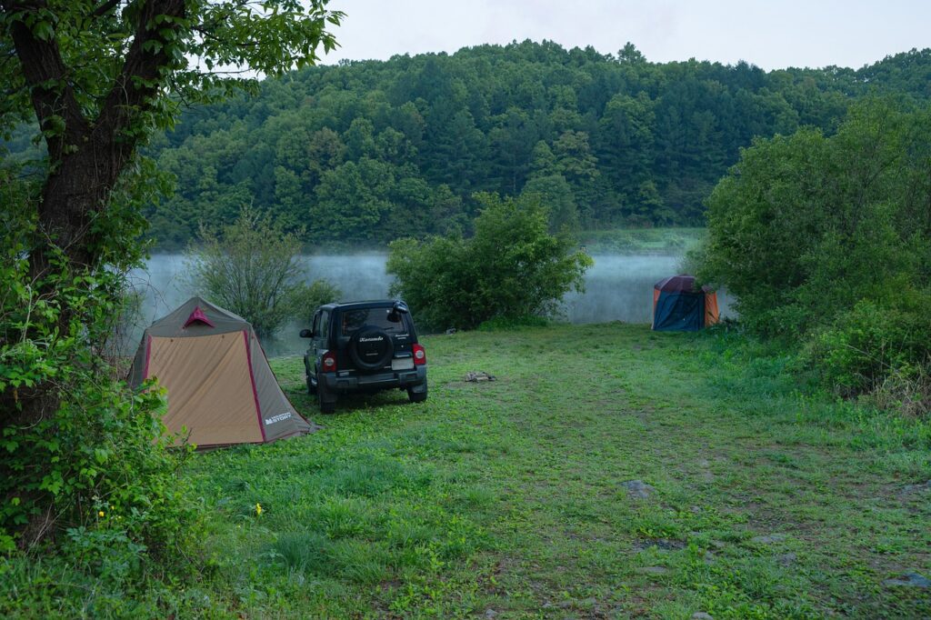 photos of tents set up at a river front campground