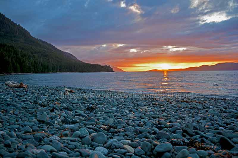 photo of the sunset over the beach at Naka Creek Campground on Vancouver Island British Columbia, Canada
